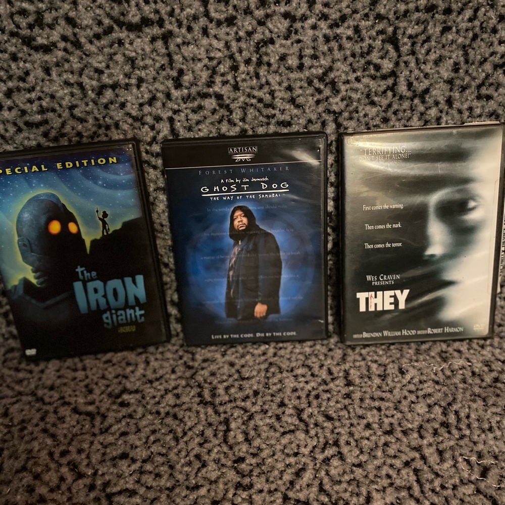 Three DVD Movie Lot — The Iron Giant, Ghost Dog, They — Black/Blue Covers